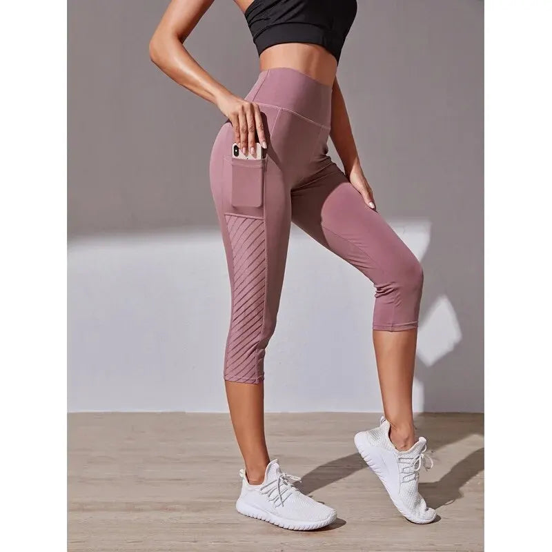 High-Waisted Hip-Lifting Slimming Yoga Crop Pants with Panel Pocket Design