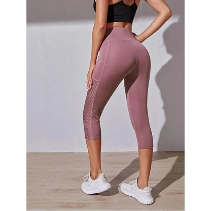 High-Waisted Hip-Lifting Slimming Yoga Crop Pants with Panel Pocket Design